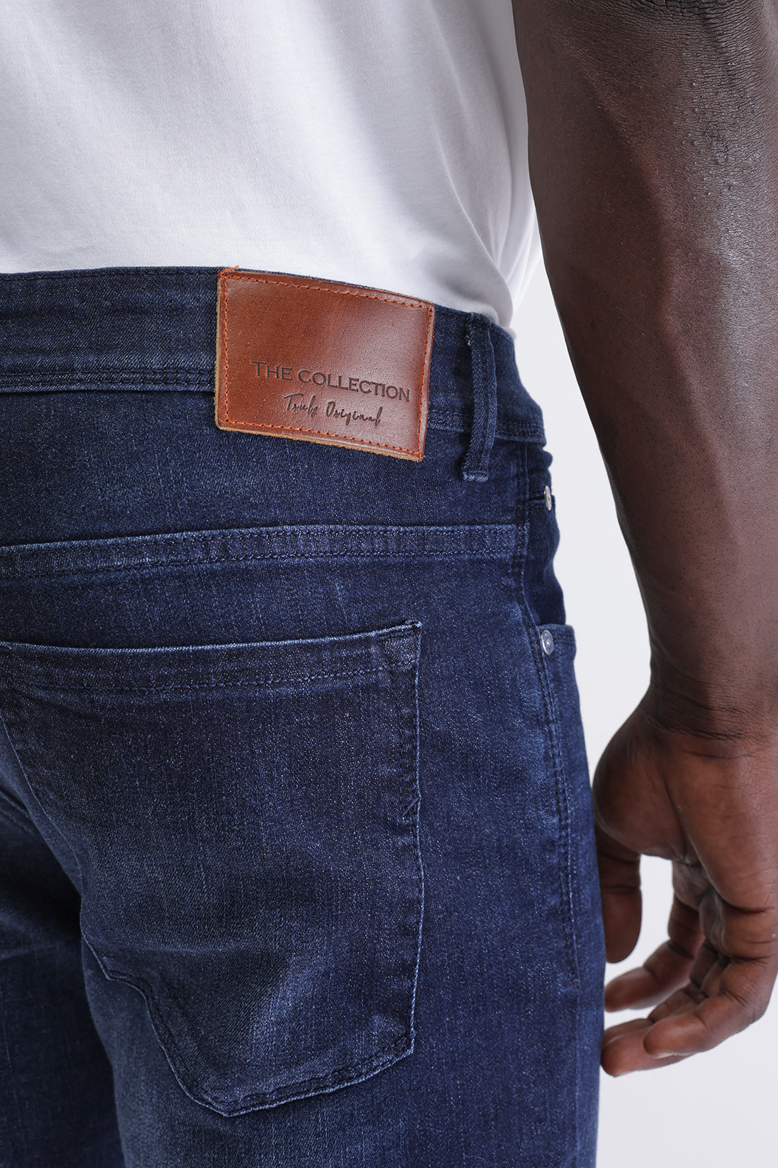 SLIM FIT MID WASH JEANS